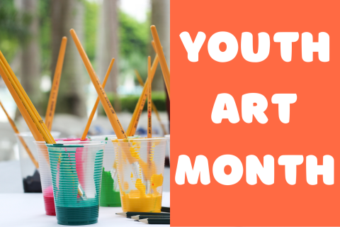 Paint cups with brushes sticking out and and orange box with the title youth art month on top